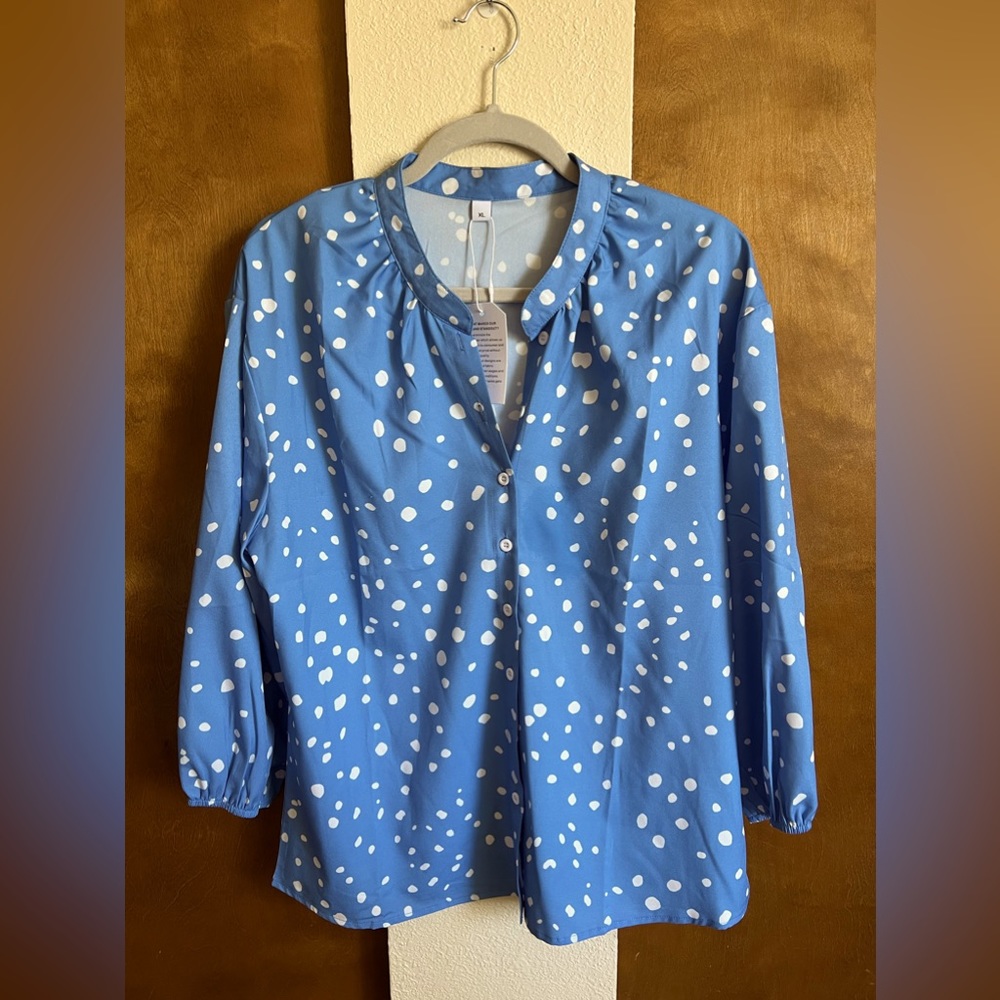 Adorable blue blouse with white polka-dots :)